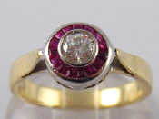 Appraisal: A yellow metal tests carat gold ruby and diamond ring