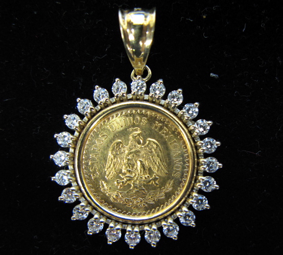 Appraisal: GOLD COIN DIAMOND AND FOURTEEN KARAT GOLD PENDANT featuring a