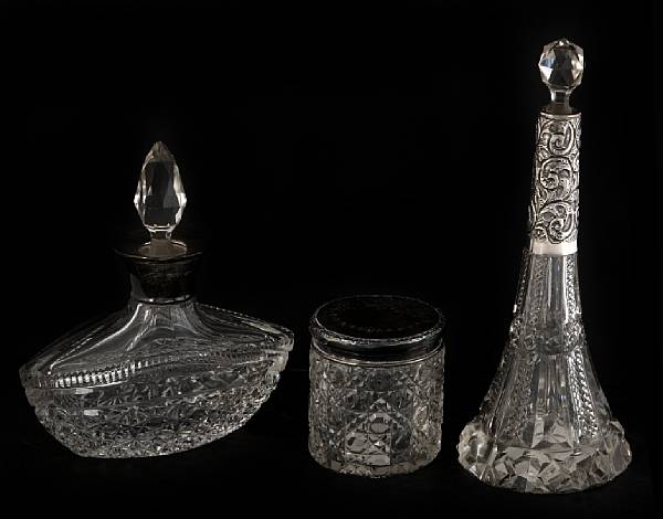 Appraisal: A group of English silver and cut glass dressing table