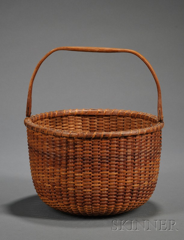 Appraisal: Woven Cane Nantucket Basket early th century round basket with