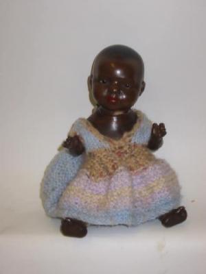 Appraisal: A Heubach Koppelsdorf bisque head black doll with brown sleeping