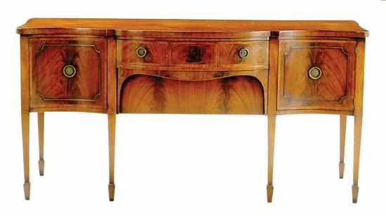 Appraisal: English inlaid mahogany serpentine sideboard late th century shaped and