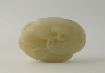 Appraisal: A Chinese white jade carving of two love birds on