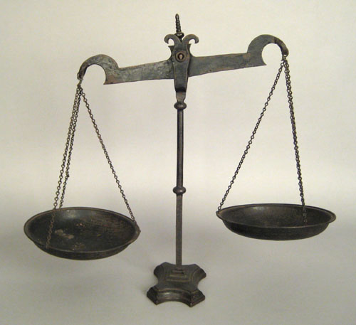 Appraisal: Wrought iron balance scale th c with a tulip finial