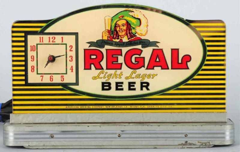 Appraisal: Regal Beer Reverse Glass Light-Up Clock With Art Deco base