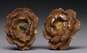 Appraisal: PAIR ANTIQUE PEONY MENUKI Pair of small antique Japanese bronze