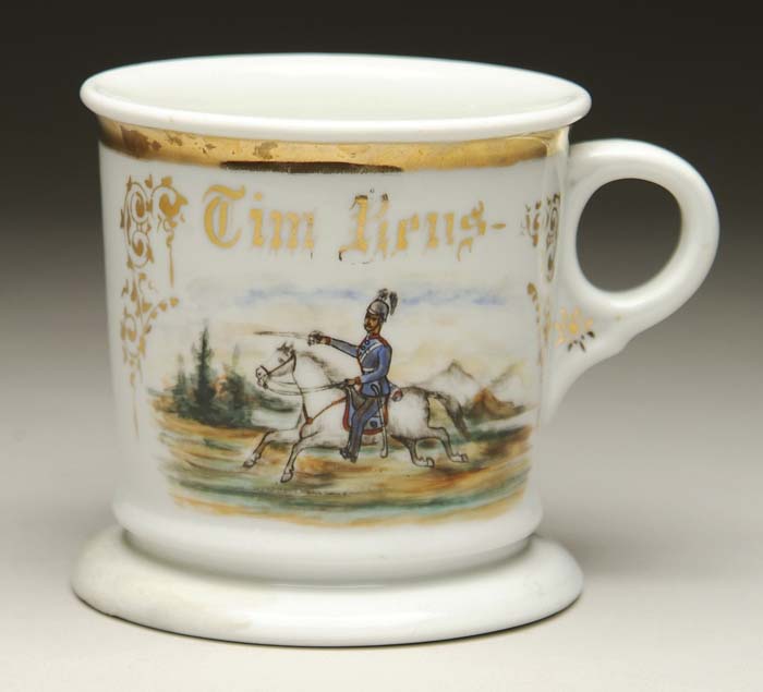 Appraisal: ANTIQUE OCCUPATINAL SHAVING MUG WITH UNIFORMED CAVALRYMEN In the late