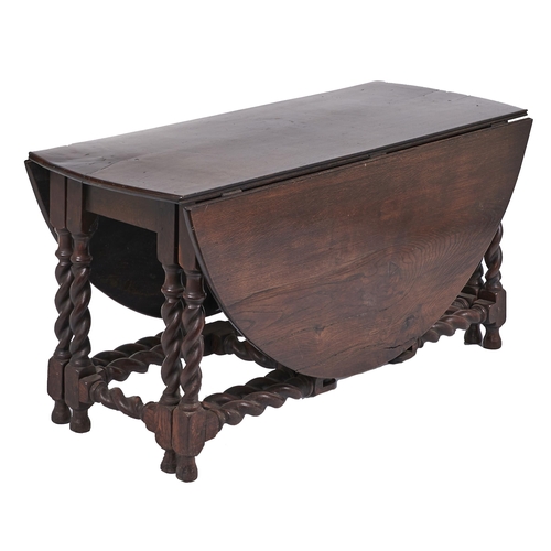 Appraisal: An oak double gateleg table th c with substantial spiral