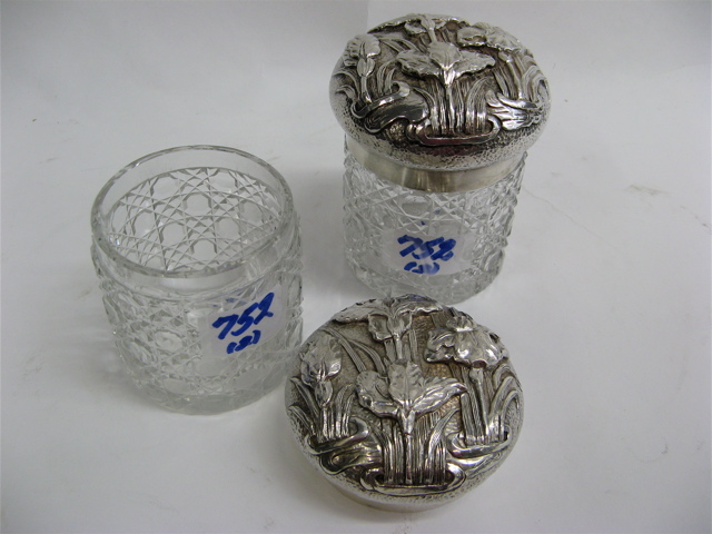 Appraisal: PAIR JAPANESE SILVER LIDDED GLASS DRESSER JARS The engraved and