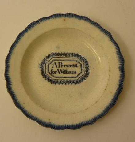 Appraisal: A PEARLWARE NURSERY PLATE c of lobed circular form with