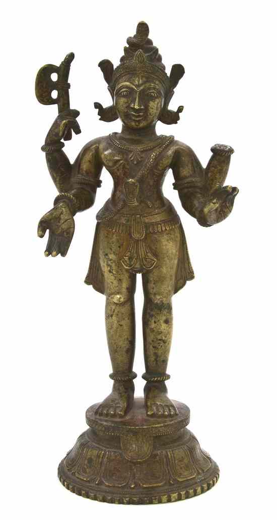 Appraisal: An Indian Bronze Figure of a Deity the standing figure