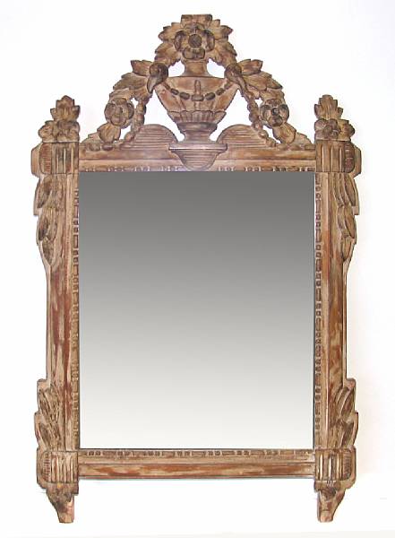 Appraisal: A Louis XVI style carved wood wall mirror height width