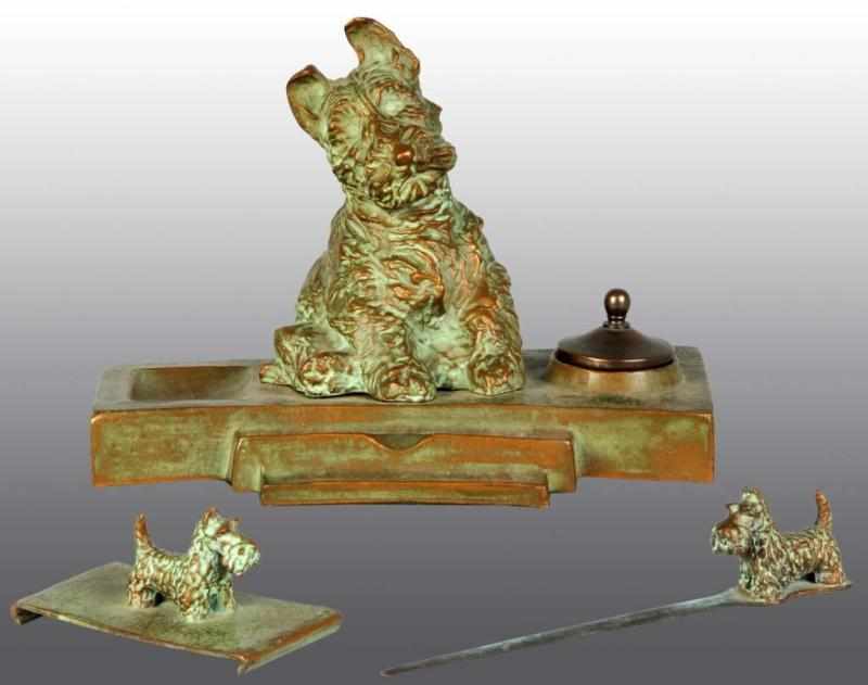 Appraisal: Lot of Scottie Desk Accessories Description Cast spelter Includes inkwell