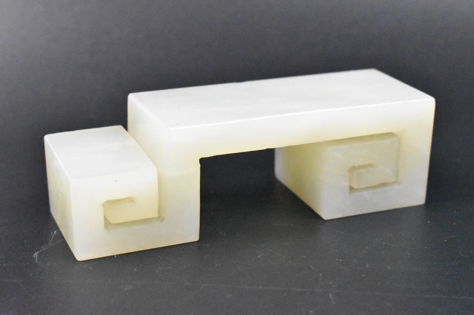 Appraisal: A Chinese white jade carved ink stand dating from the