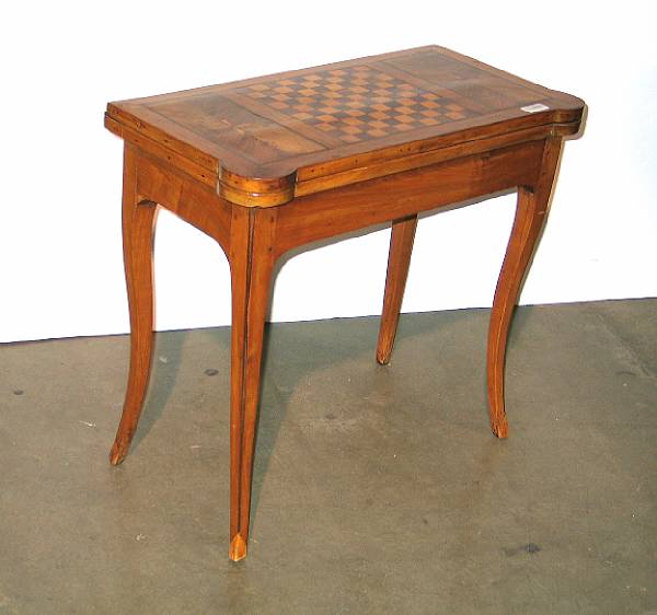 Appraisal: An Italian Rococo fruitwood games table composed of antique elements