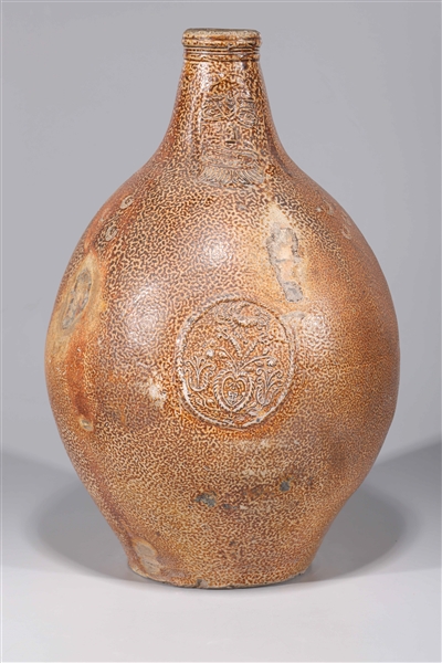 Appraisal: Large antique German bellarmine jug with face and city marks