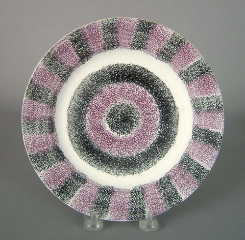 Appraisal: Purple and black rainbow spatter plate th c dia