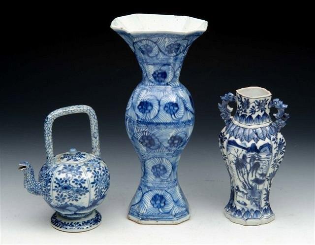 Appraisal: A KANGXI BLUE AND WHITE EIGHT PANELLED VASE with dragon