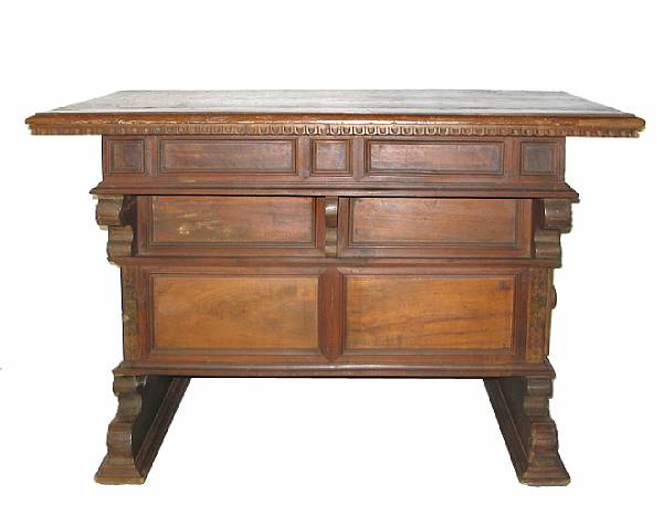 Appraisal: An Italian carved walnut desk comprised of antique elements height