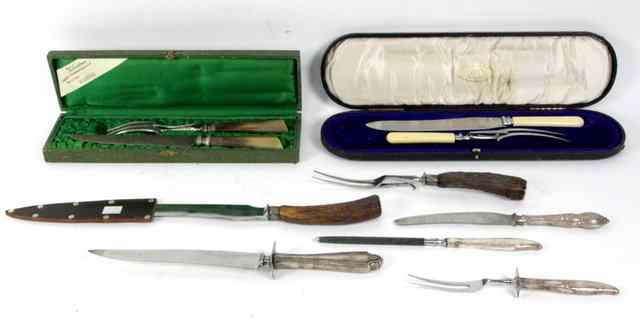 Appraisal: Two boxed carving sets and a quantity of carving implements