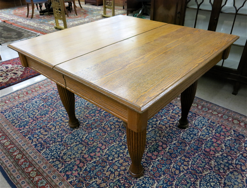 Appraisal: SQUARE OAK DINING TABLE American c standing on five reeded