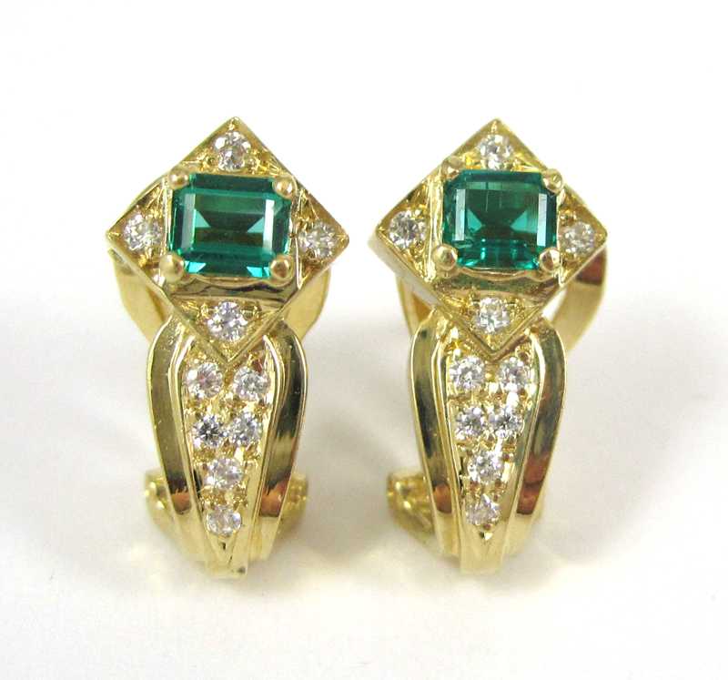 Appraisal: PAIR OF EMERALD AND DIAMOND EARRINGS each k yellow gold