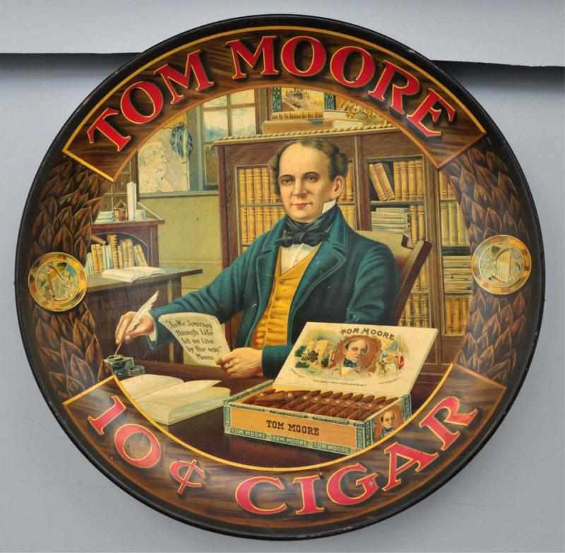 Appraisal: Tin Thomas Moore Cigars Charger Description Nice piece with bold