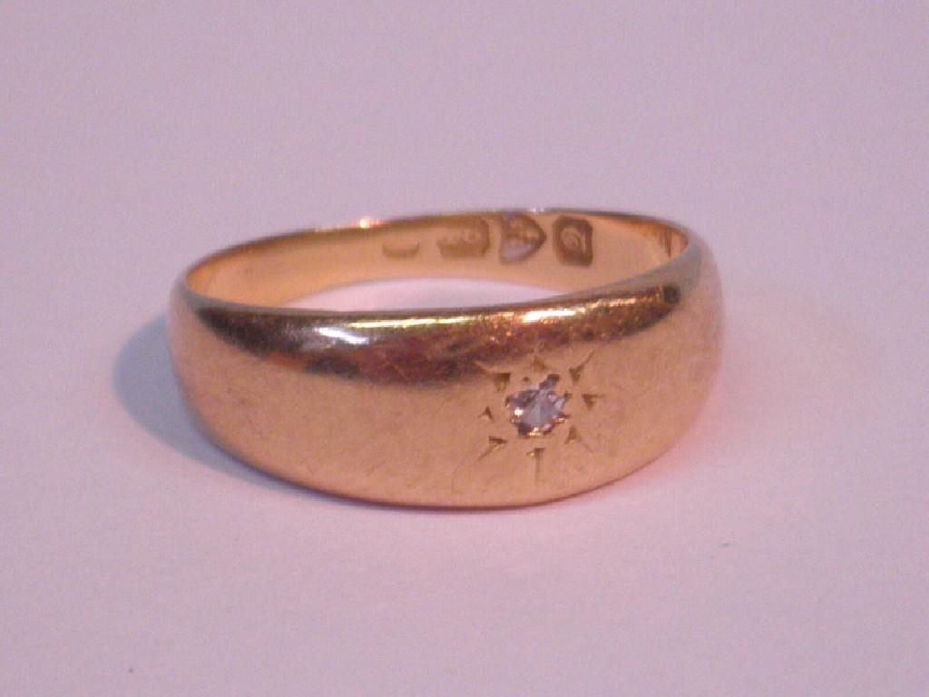 Appraisal: An ct gold signet ring set with a tiny diamond