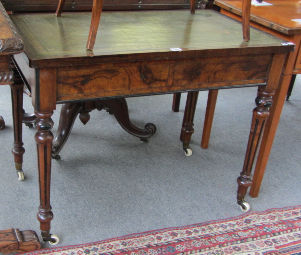 Appraisal: A Victorian figured walnut writing desk the gilt tooled green