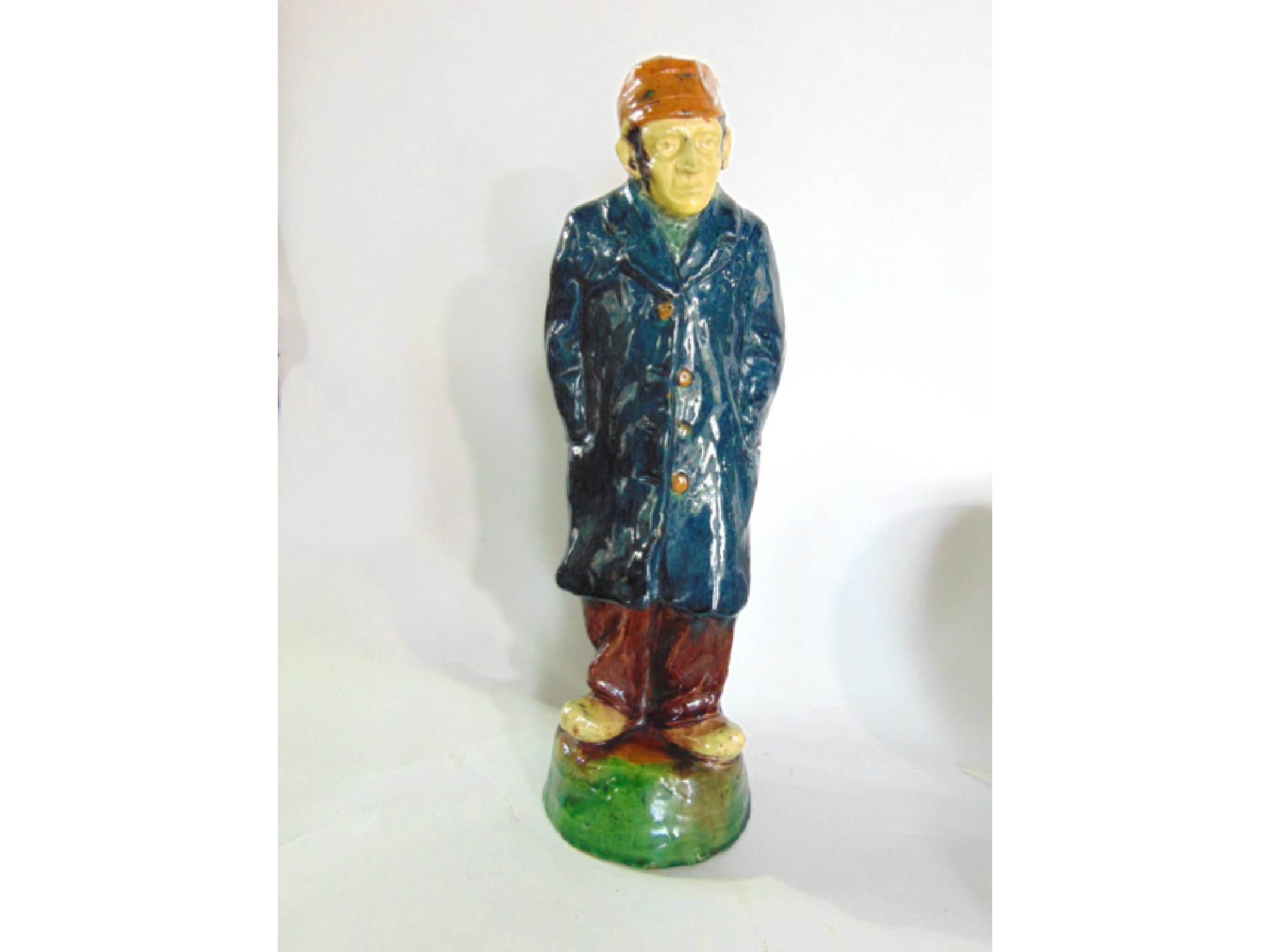 Appraisal: An unusual early th century continental pottery figure of a