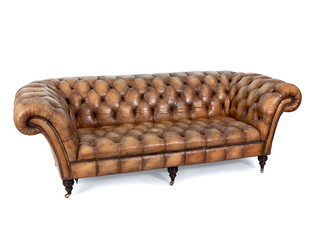 Appraisal: A Brown Leather Upholstered Chesterfield Sofa Height x width x