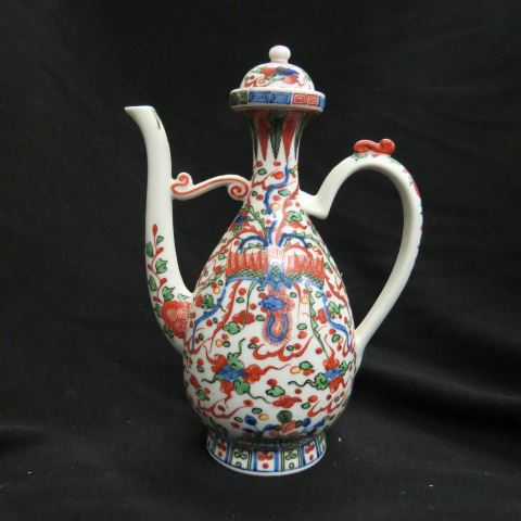 Appraisal: Oriental Porcelain Coffee Or Teapot Turkish form dragon foliage decor