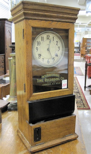 Appraisal: AN OAK CASED TIME RECORDING CLOCK International Time Recording Co