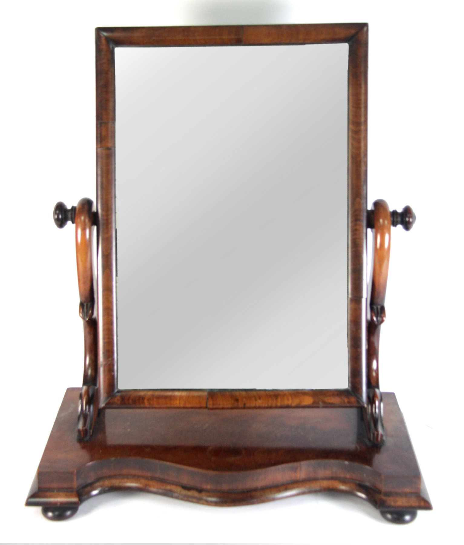 Appraisal: A Victorian mahogany swing frame mirror the rectangular glass on