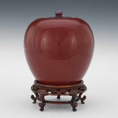 Appraisal: A Chinese Flambe Jar On Stand Of globular form with