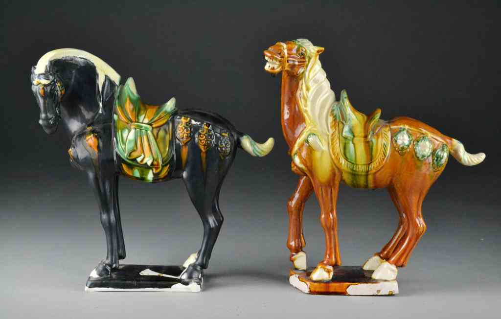 Appraisal: Chinese Tang Pottery Horses with SaddlesOne in black and one