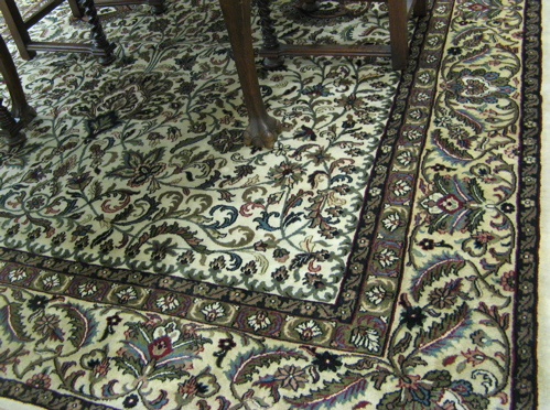 Appraisal: HAND KNOTTED ORIENTAL CARPET Indo-Persian overall floral design on rectangular