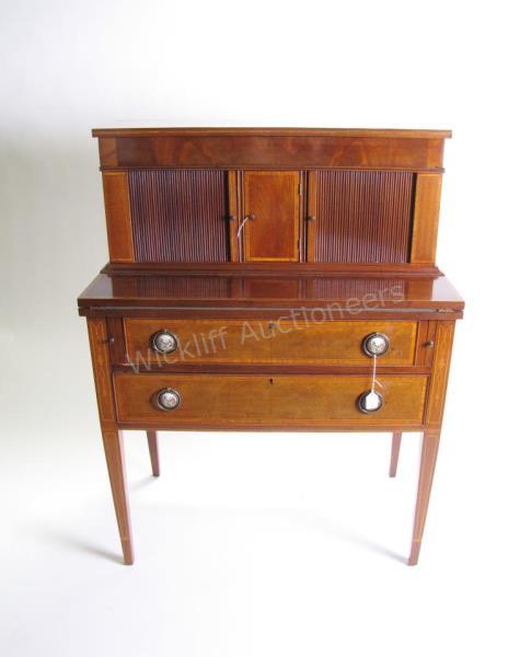 Appraisal: Vintage mahogany period-style tambour desk with fitted interior in top