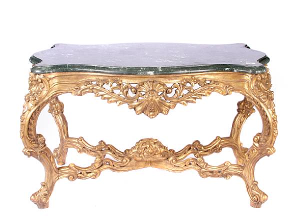 Appraisal: A Louis XV style giltwood and marble topped salon table