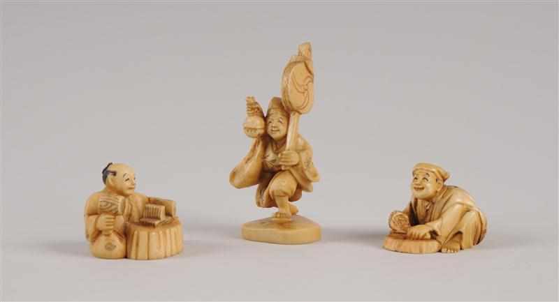 Appraisal: JAPANESE CARVED BONE FIGURE AND TWO NETSUKES The one a