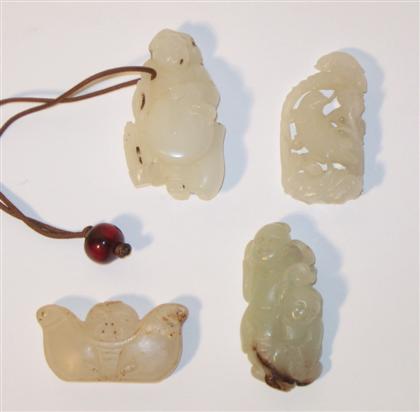 Appraisal: Four Chinese white jade pendants Qing dynasty Comprising a well-carved