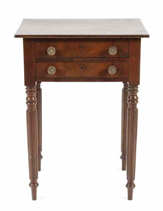 Appraisal: An American Walnut Work Table having a rectangular top above