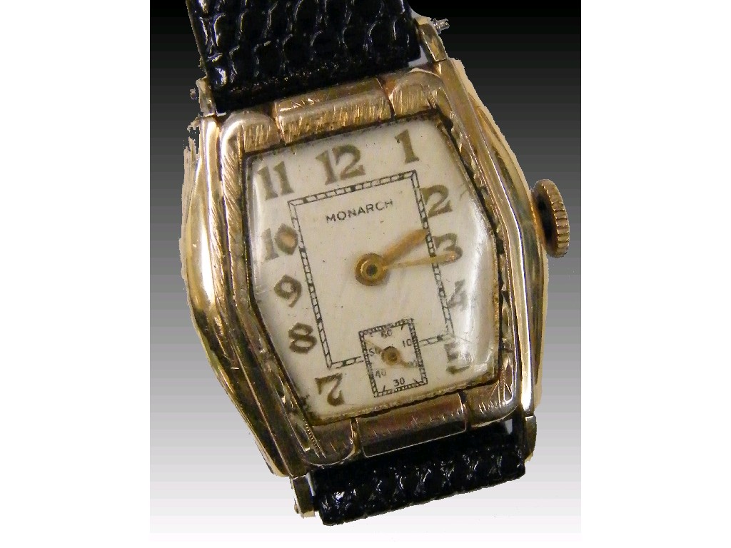 Appraisal: Monarch gold plated tonneau cased mid-sized wristwatch the dial with