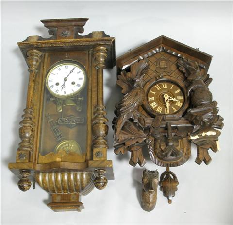 Appraisal: TWO WOOD WALL CLOCKS VICTORIAN BLACK FOREST The first a