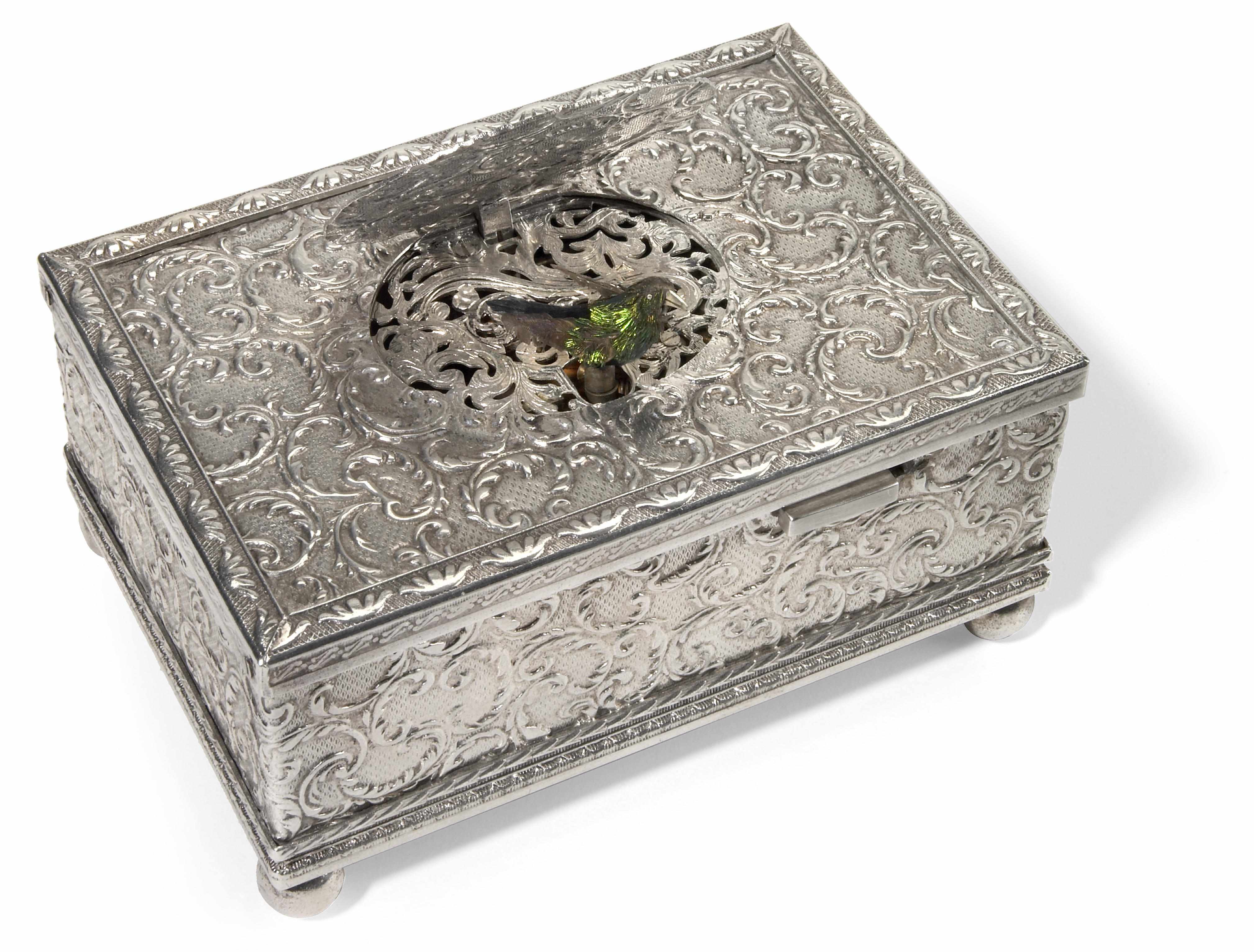 Appraisal: A Continental silver singing bird music box th century Overall