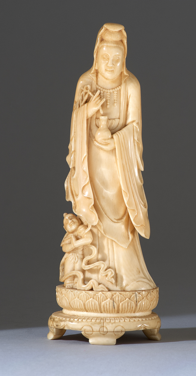 Appraisal: IVORY FIGURE OF GUANYIN th CenturyIn standing position on a