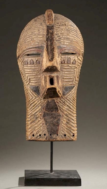 Appraisal: Songe Kifwebe face mask th c A polychrome Kifwebe face