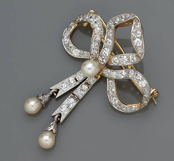 Appraisal: A diamond and cultured pearl bow brooch-pendant estimated total diamond