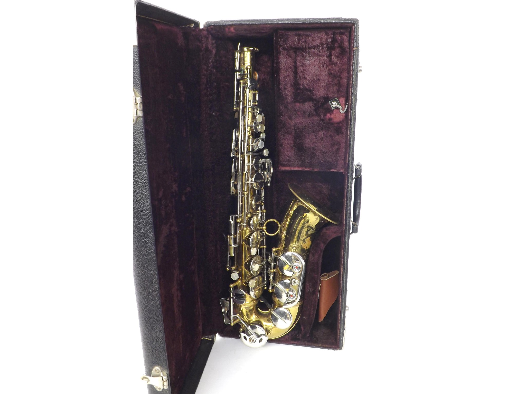 Appraisal: Martin Busine gold lacquered alto saxophone with foliate engraved bell