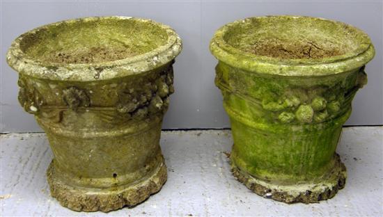 Appraisal: Pair of th century composite round planters decorated with festoons